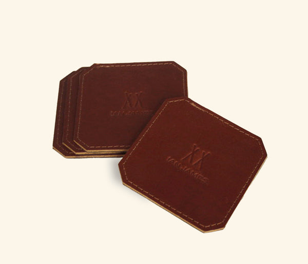 Handmade brown leather coaster set in vegetable-tanned leather