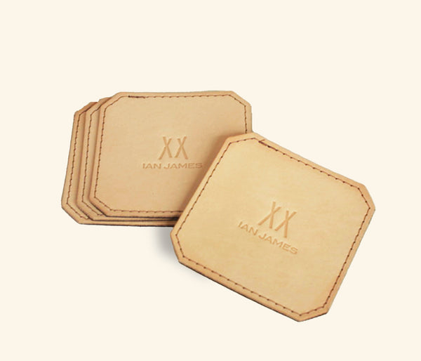 Handmade vegetable-tanned leather coasters set